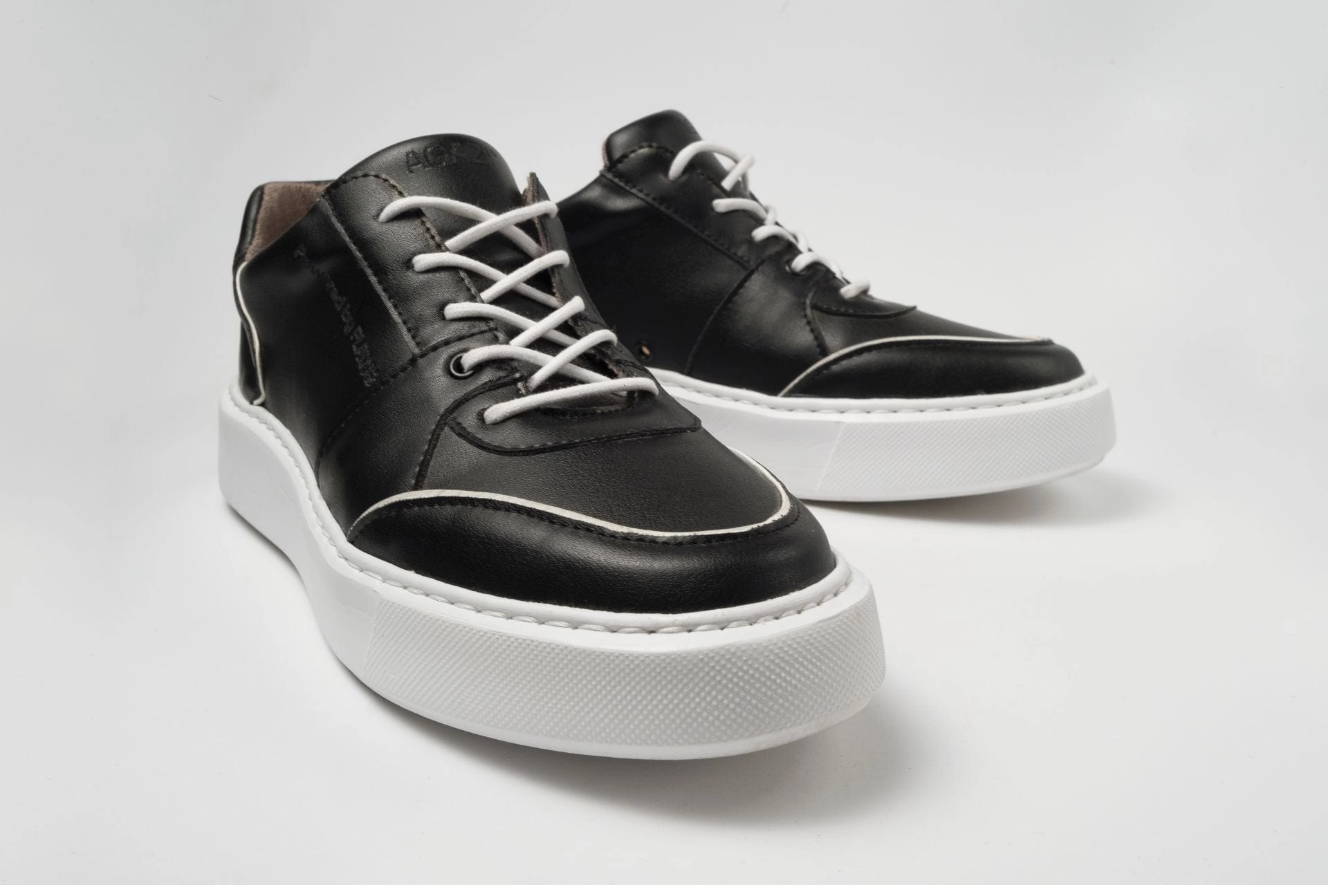 Emi Women's Vegan Leather Sneakers | Black & White